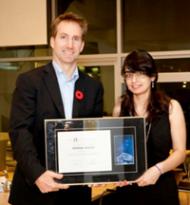 Romina Abachi receives the Luke Santi award from the hands of Greg Dick