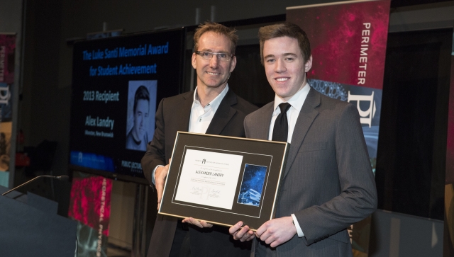 Alexander Landry receiving his award from the hands of Greg Dick